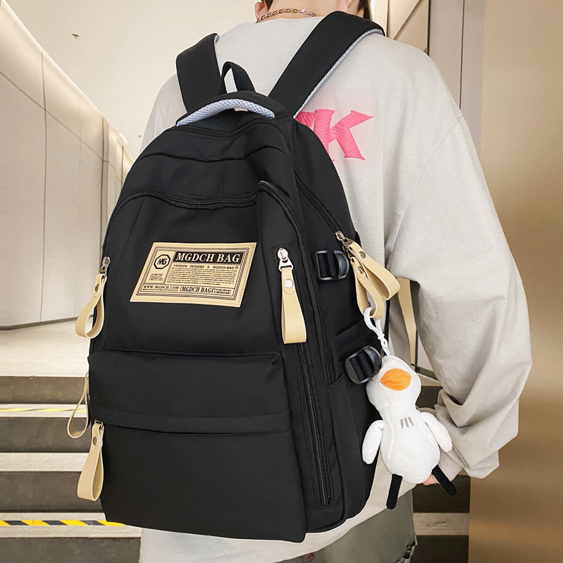 新しいカバンの女子大学生の中学生の少女のランドセルのシンプルな大容量の男子のリュックサックの卸売り|undefined