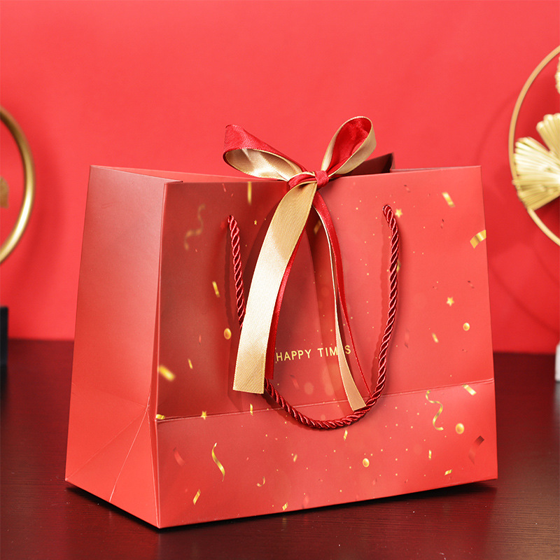 Red festive red gift bag candy packaging bag gift bag New Year gift bag universal paper bag handbag ribbon