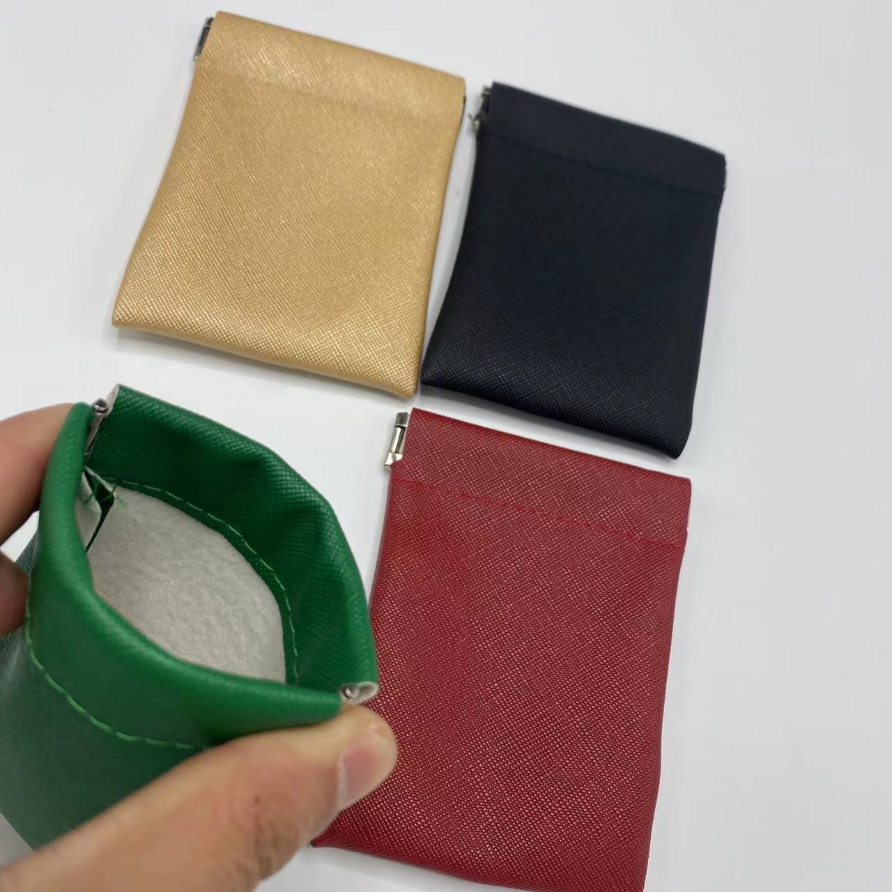 Storage bag spot wholesale PU headset shrapnel storage bag portable automatic closing data cable change storage bag