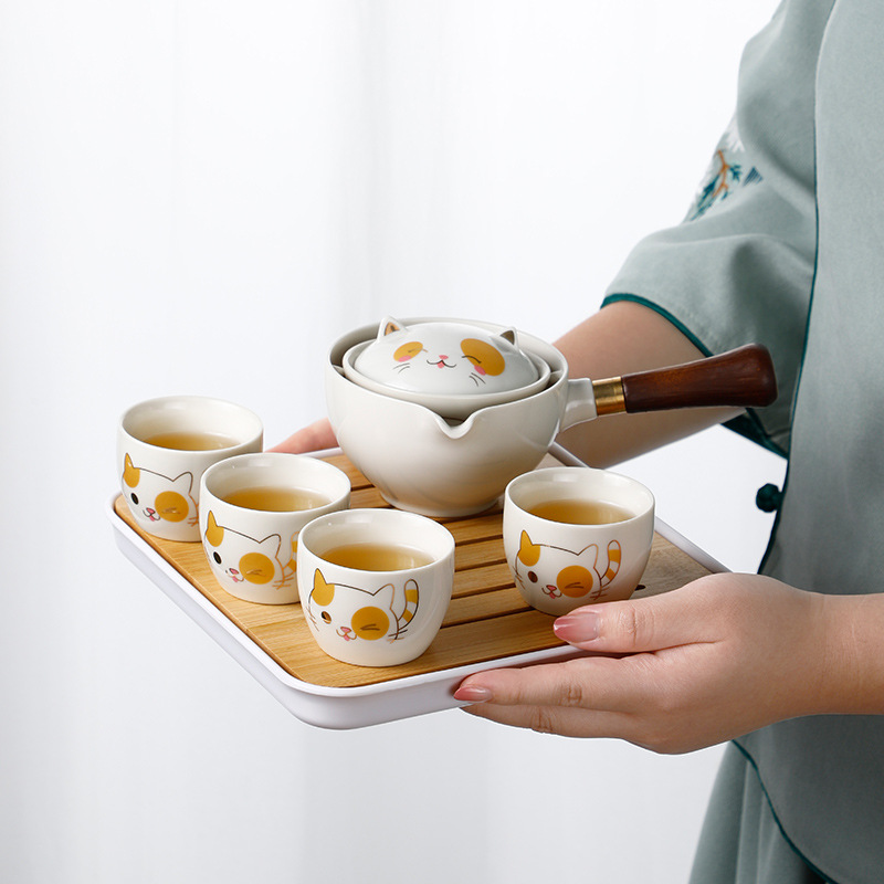 Rotating a Pot of Four Cups Travel Tea Set Accompanying Gift Tea Pot Household Ceramic Side Handle Pot Not Hot Lazy Tea Maker