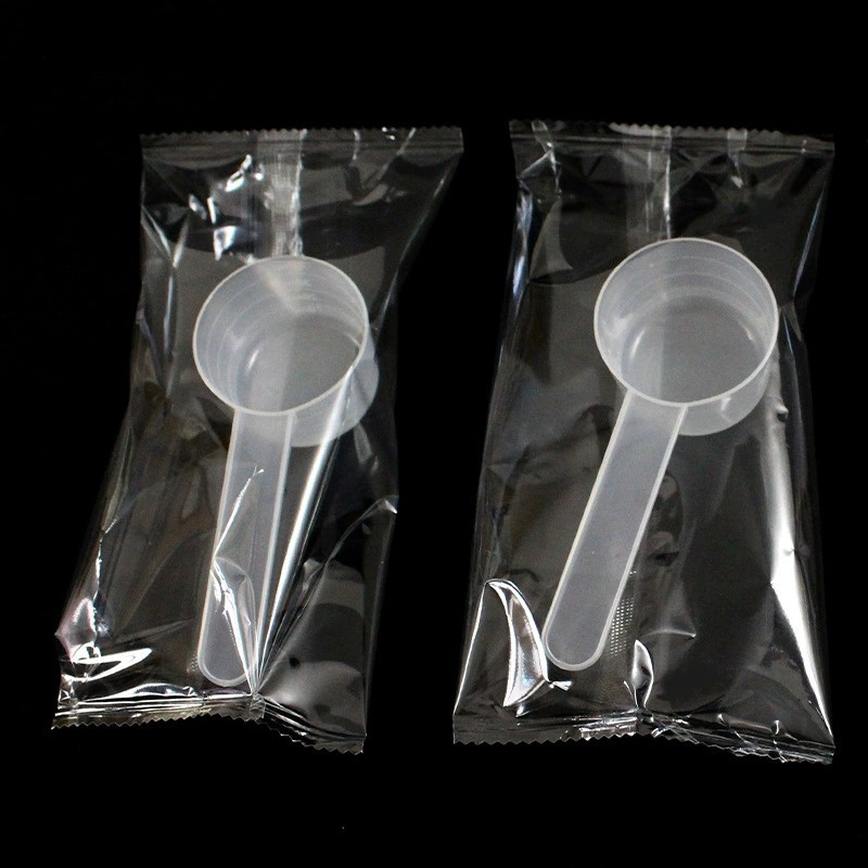 Plastic measuring spoon wholesale 20g spoon independent packaging 40ml transparent quantitative powder liquid with scale