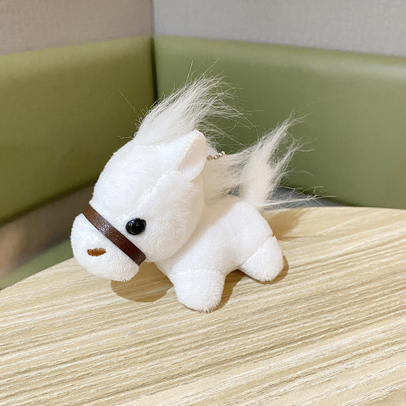 卓球の馬竜の同じ種類の馬のぬいぐるみの小さいペンダントのリュックサックのキーホルダーは漫画の人形を飾って飾ります。|undefined