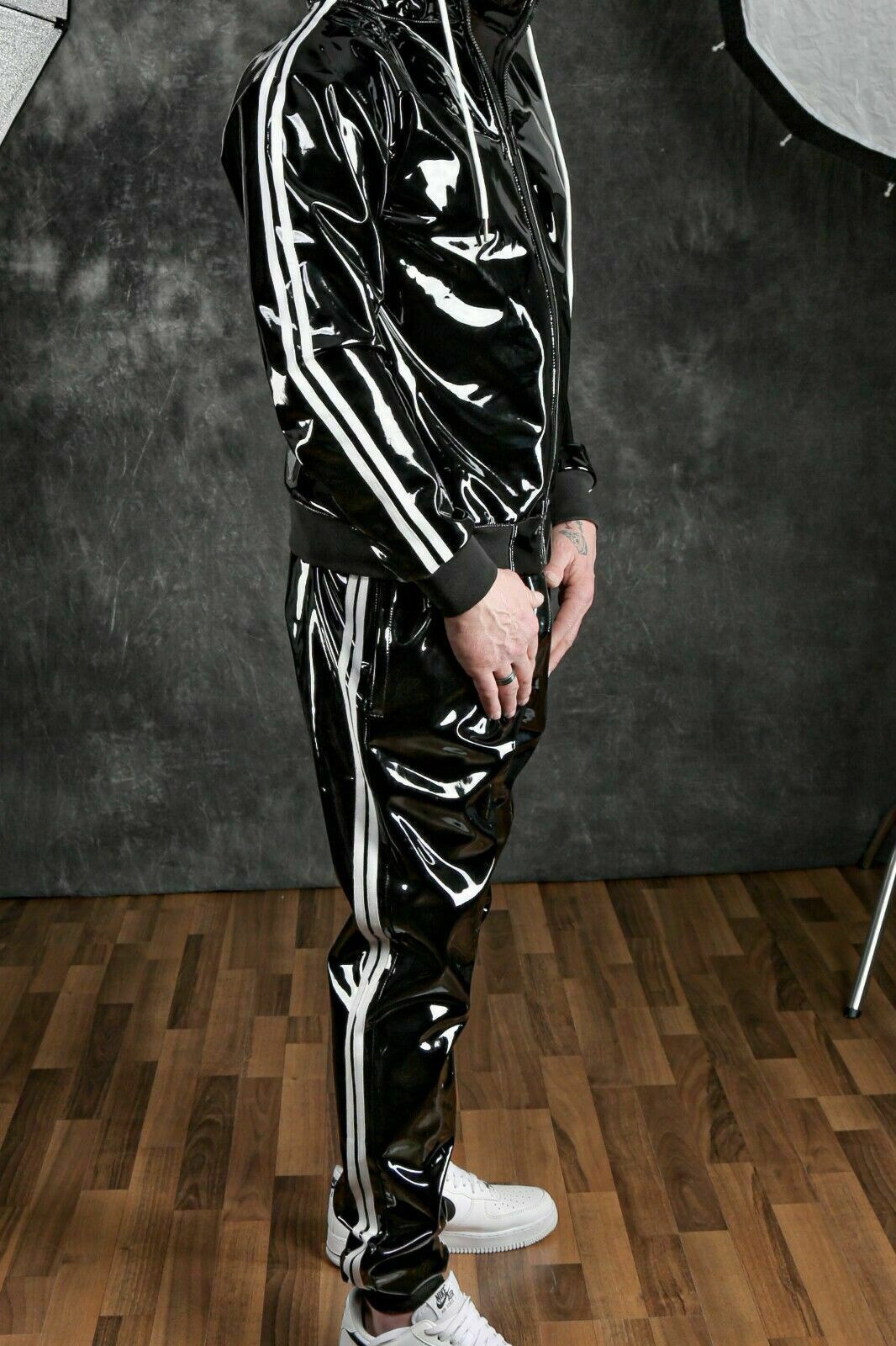 2021 Amazon wish new hooded fashion PU bright leather sports suit TZ2399