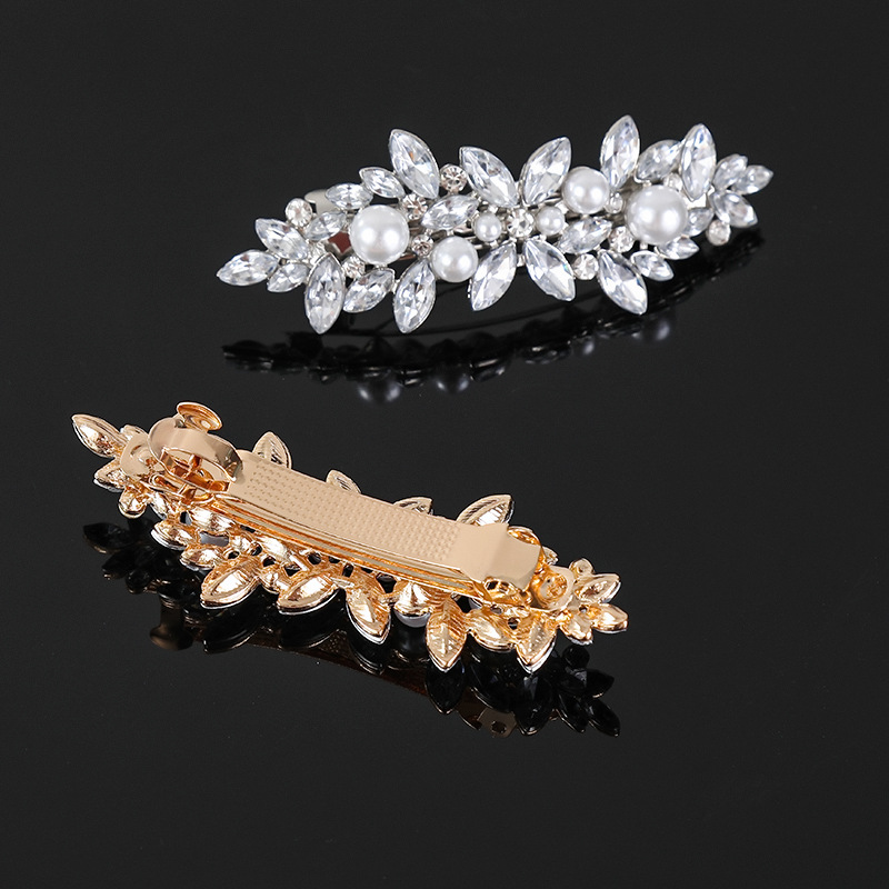 Cross-border new elegant temperament spring clip alloy hairpin rhinestone Korean version of the back of the head ponytail clip headdress wholesale_voghion.com
