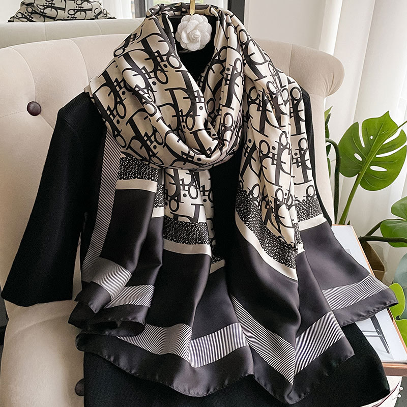 Spring new Korean version of artificial silk scarf women's plain printed beach towel letters warm shawl new silk forging wholesale