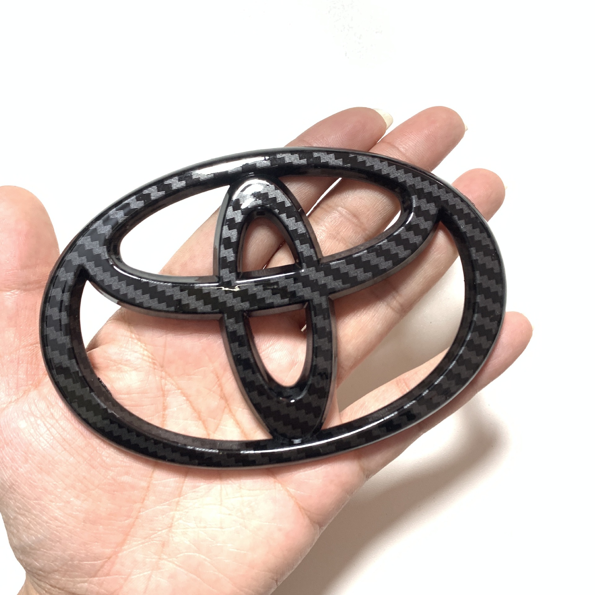 Suitable for Toyota front and rear car logo Camry Crown Ruizhi Garland Vichi Highlander Carola steering wheel car