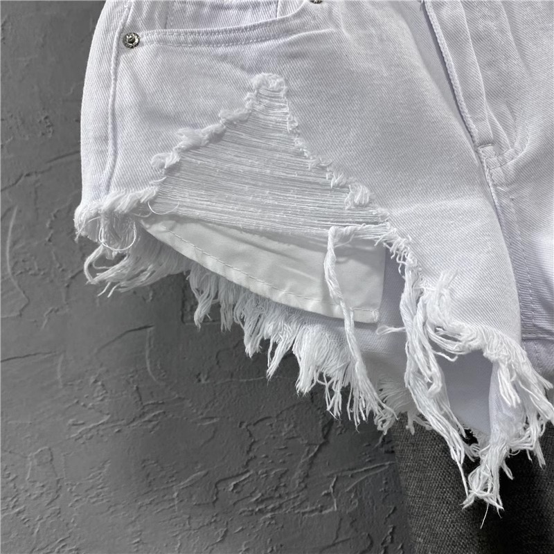 European and American fashion low waist shorts women's wool pants 2024 new summer white jeans ripped A word hot pants tide