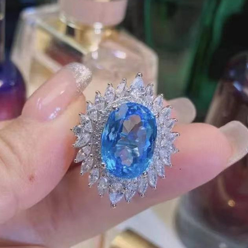 曹適淘寶直播 仿天然瑞士托帕藍色戒指 豪華滿鑽鋯石女戒