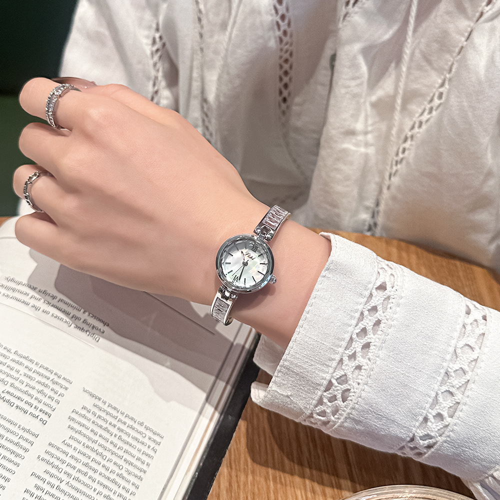 Time and Space Corridor New Entry Light Luxury Rhinestone Elegant Bracelet Watch Niche Simple Fashion Casual Women's Quartz Steel Band Watch