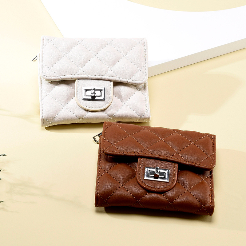 New Korean-style women's wallet with a honeycomb pattern, simple design for girls, multi-card slots, anti-magnetic, student zero wallet, wholesale