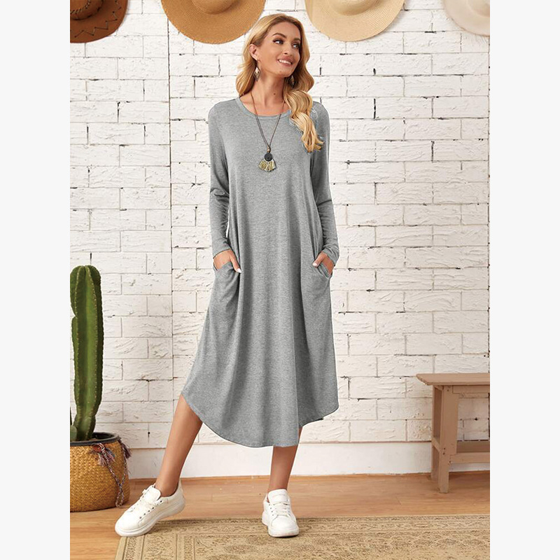 2022 autumn and winter New European and American women's solid color knitted side seam straight pocket curved hem loose dress