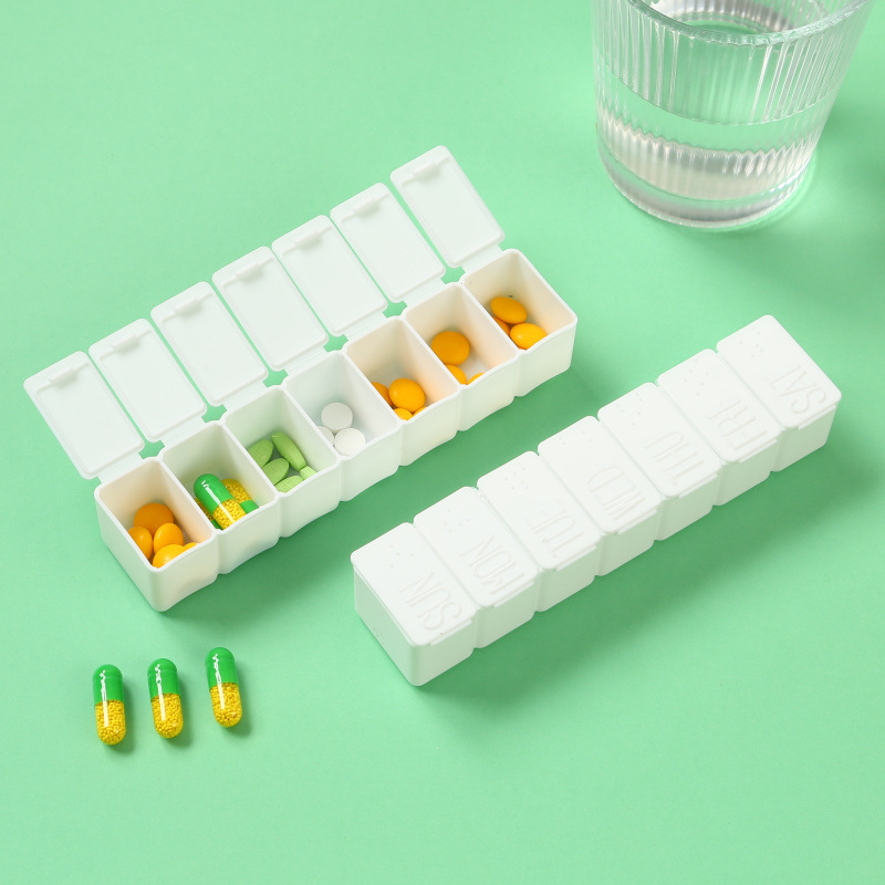 Wholesale weekly pill box strip-type 7-day pill box 7-grid sub-packing pill box convenient advertising storage box in stock