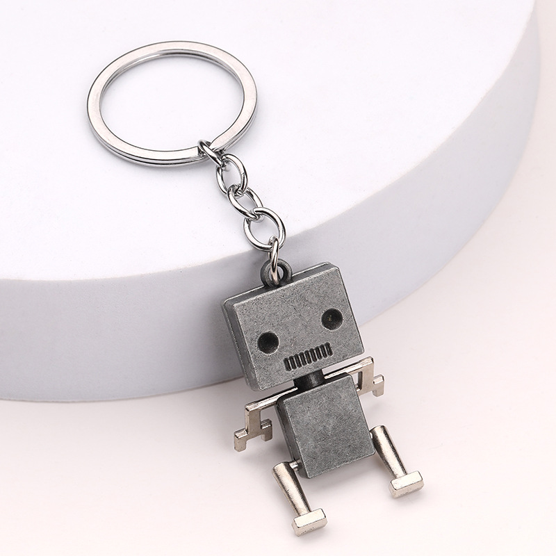 Creative movable robot keychain small box cartoon pendant key ring chain wholesale small gift wholesale