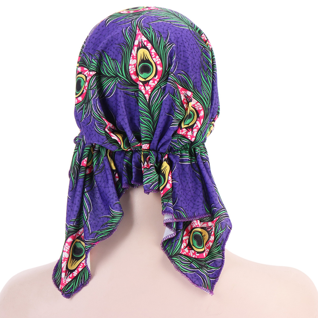 Europe and the United States new flower cloth curved cashew feather head cap two-horn cap elastic Muslim turban cap