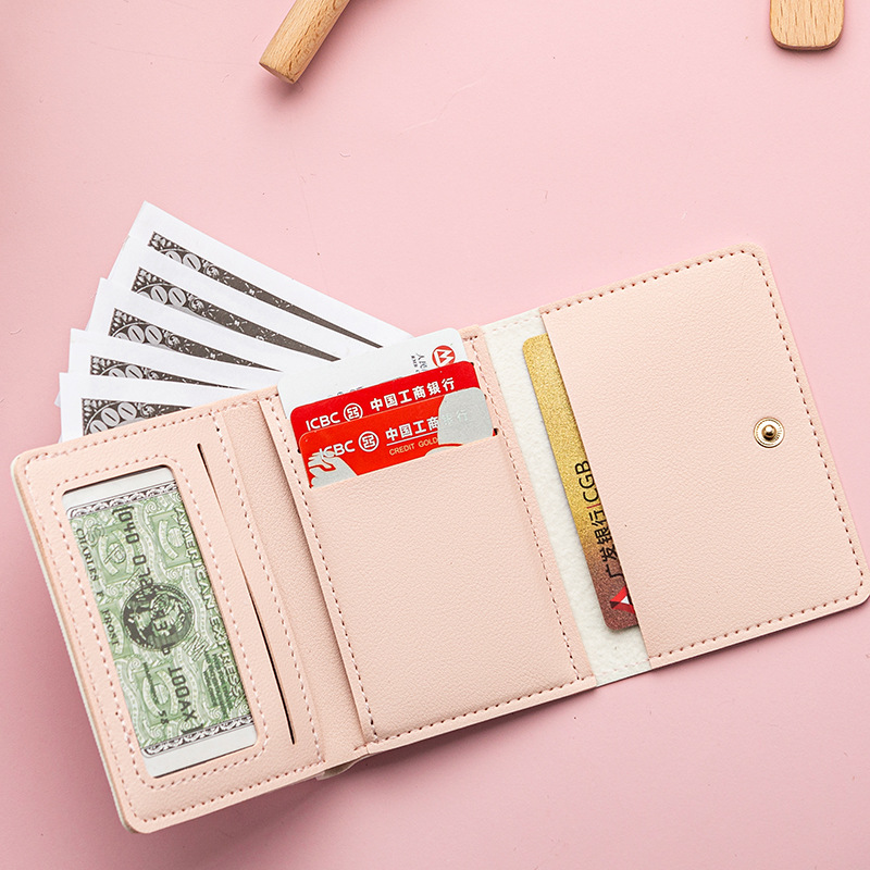 Cross-border manufacturers wholesale cartoon women's buckle short three-fold wallet card bag coin purse multi-card wallet