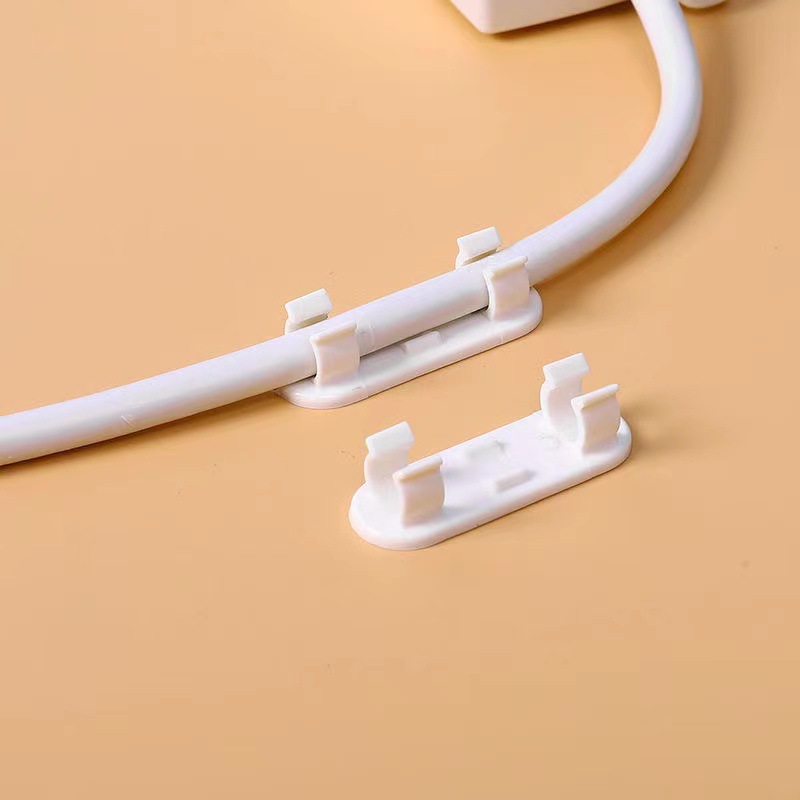 Plug-in Holder Plug-in Board Wall Socket Self-adhesive Wall Hanging Punch-free Socket Fixing Sticker