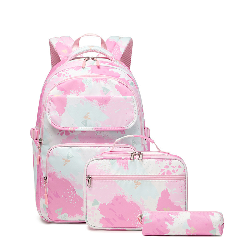 新商品の三点セットは色のプリントのランドセルの女の子の小学生のかばんにぶつかります。|undefined
