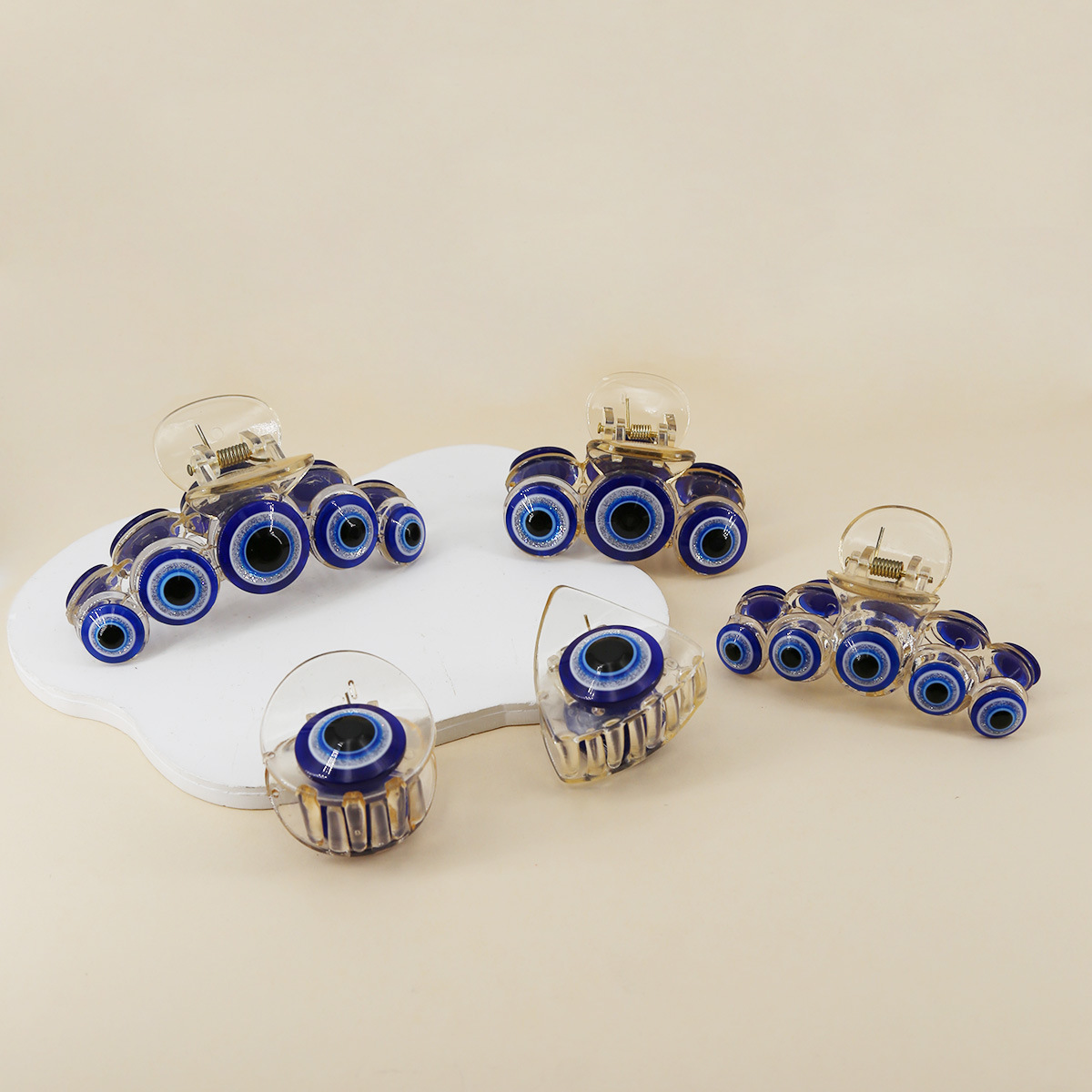 Europe and the United States new combination of large, medium and small back of the head bangs side does not hurt hair hair accessories Devil's Eye ha_voghion.com