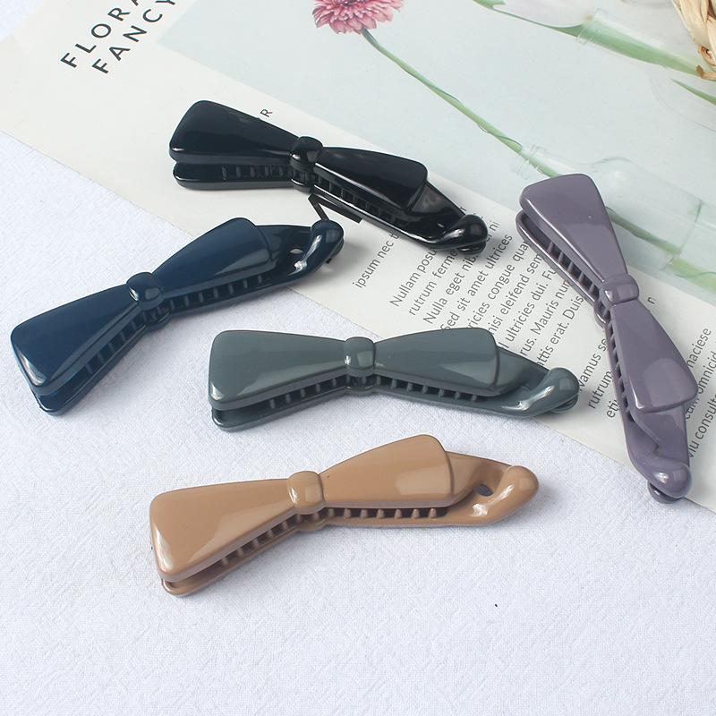 2023 new twist clip solid color banana clip vertical clip ponytail hairpin back head female simple temperament plate hairpin