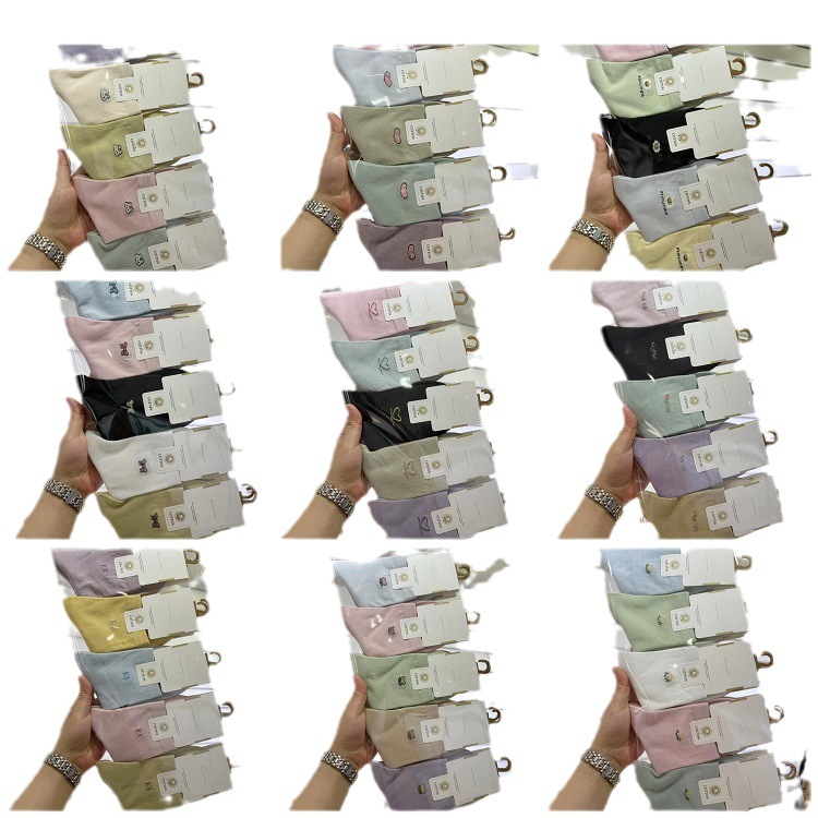 Yungemei spring and summer new men's and women's mesh tube business cotton socks sports leisure student socks running wholesale