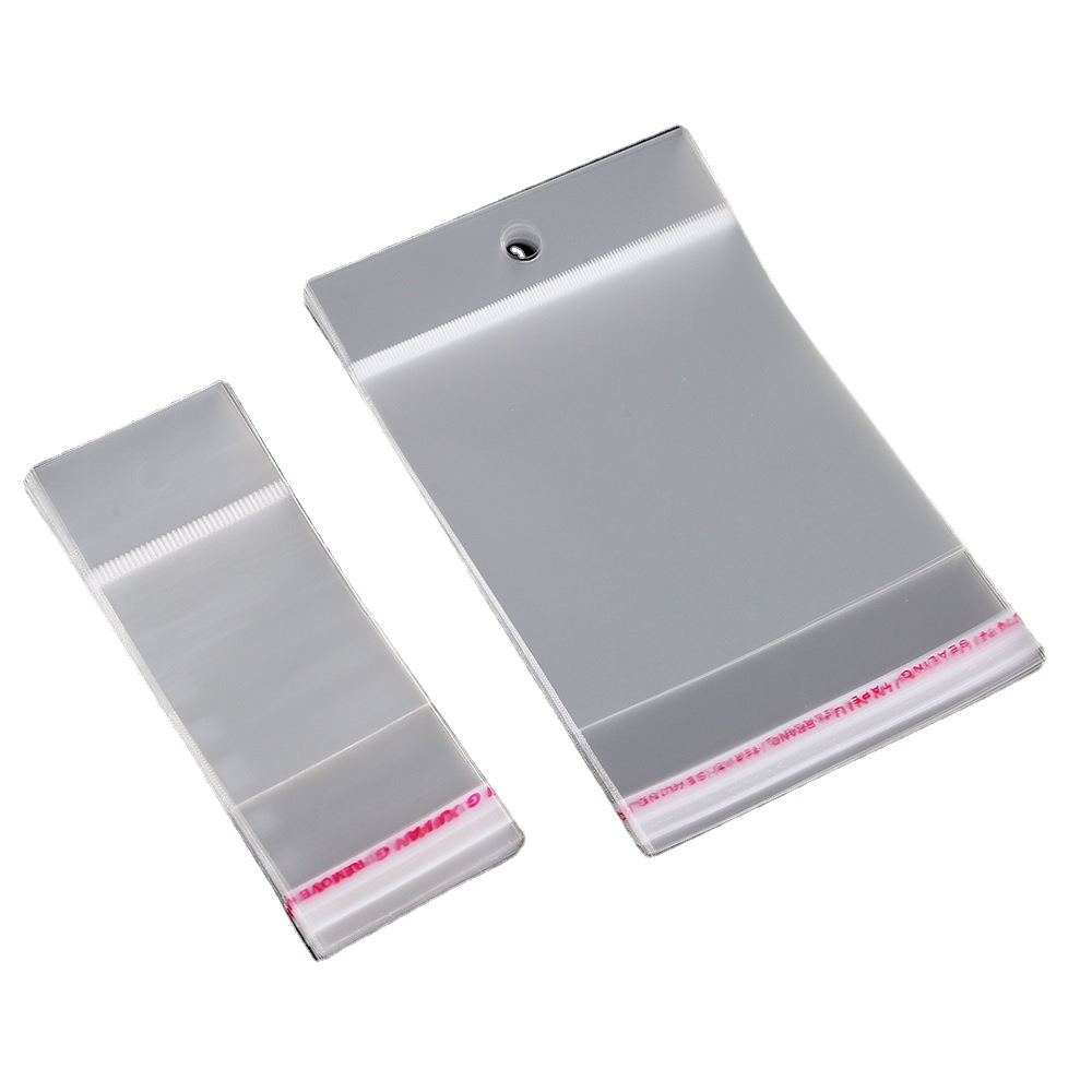 Spot OPP self-adhesive bag card head hanging hole transparent bag Pearl film card head bag aircraft hole transparent bag can be printed