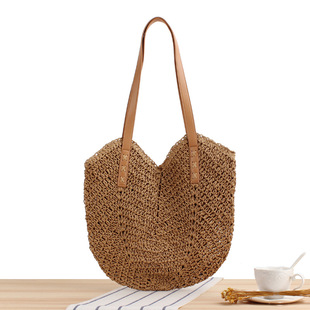 A generation of ins New hollow woven bag fashion shoulder straw woven bag paper rope casual women's bag beach bag