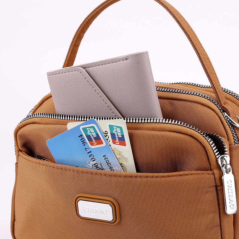 [Manufacturer's supply] new one-shoulder diagonal women's bag portable cloth bag fashion nylon small square bag multi-compartment