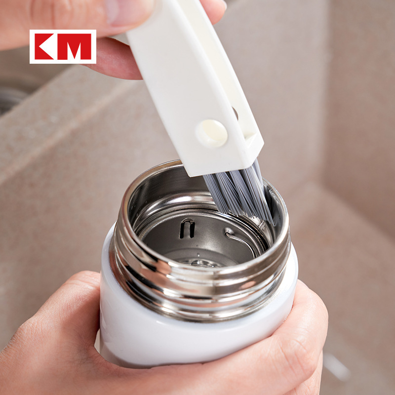 5053. The inner side of the insulation cup cover gap brush kitchen gap cleaning brush three brush one free switch