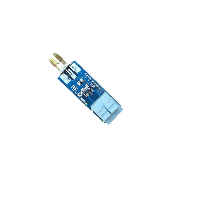 Miniature 1:9 HF antenna balun