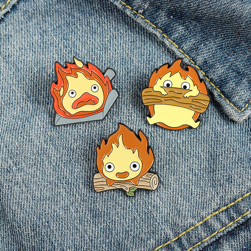 2021 new jewelry cartoon character shape brooch cartoon cute flame paint badge put light buckle batch