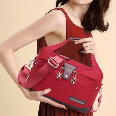 [Stock] canvas handbag 2023 new ladies large capacity nylon Oxford shoulder crossbody backpack