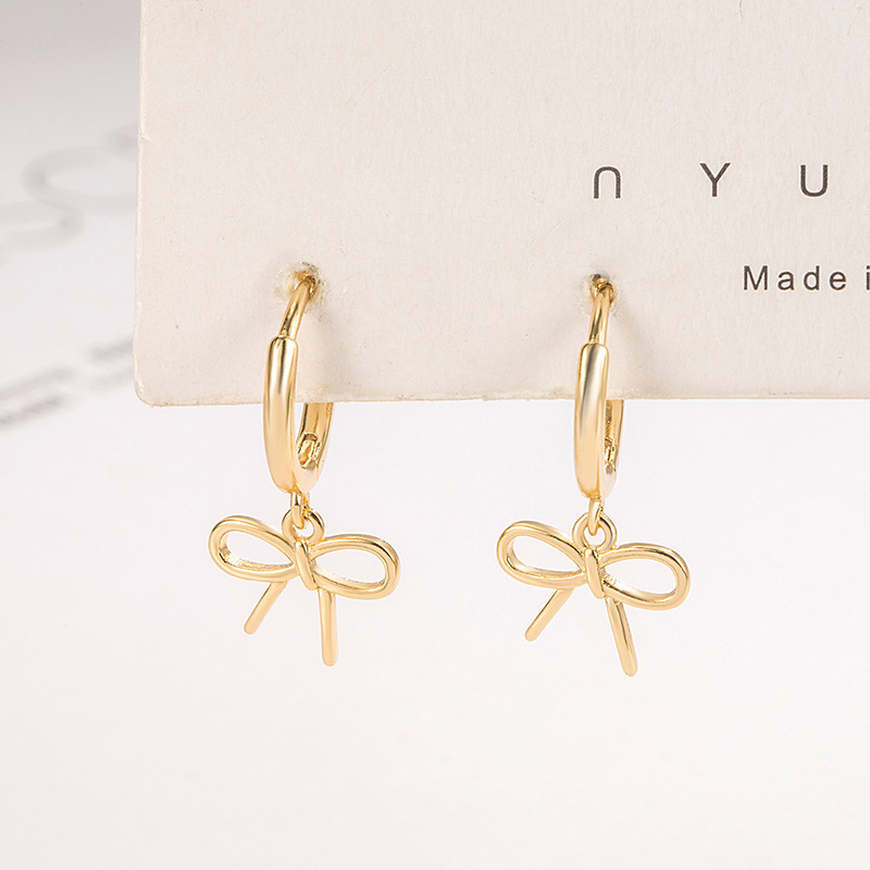 Earring earrings hollow bow earrings female niche design temperament earrings earrings 2022 new trend