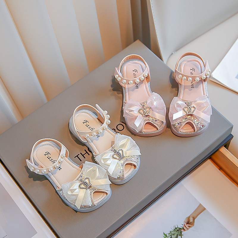 Summer 2023 Sweet Bow Princess Shoes Baotou Pearl Korean Style Girls' Sandals Hollow Breathable Non-slip Soft Sole