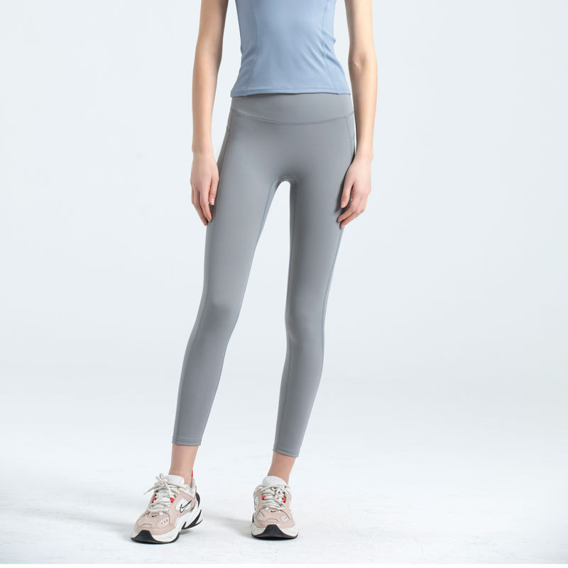 Juyitang nude yoga clothes women's summer sportswear fitness pants high waist peach European and American nylon tight yoga pants
