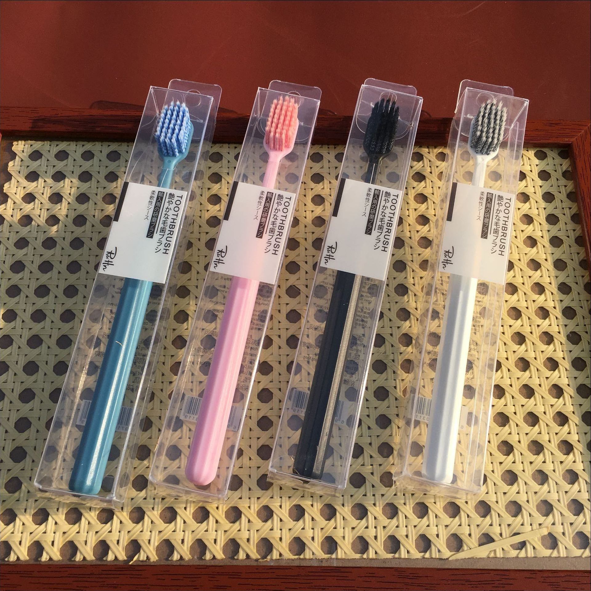 Imported spiral wire toothbrush black and white wide head soft bristle toothbrush single pack toothbrush chain cross-border hot sale factory direct sales
