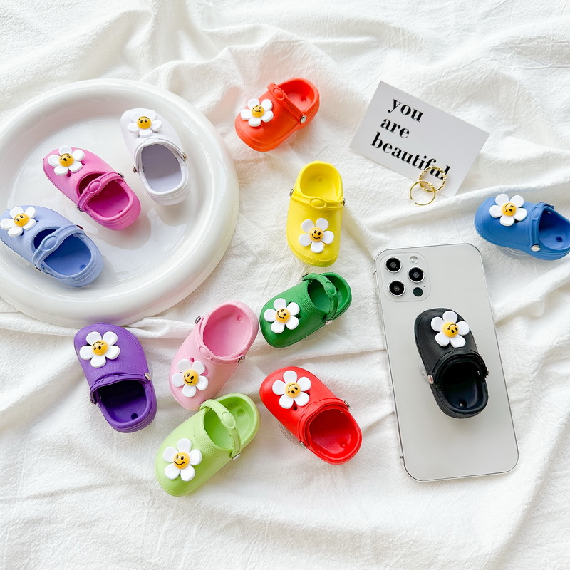 Simulation hole shoes mobile phone airbag bracket flower smiley face small slippers adhesive retractable fresh ins style