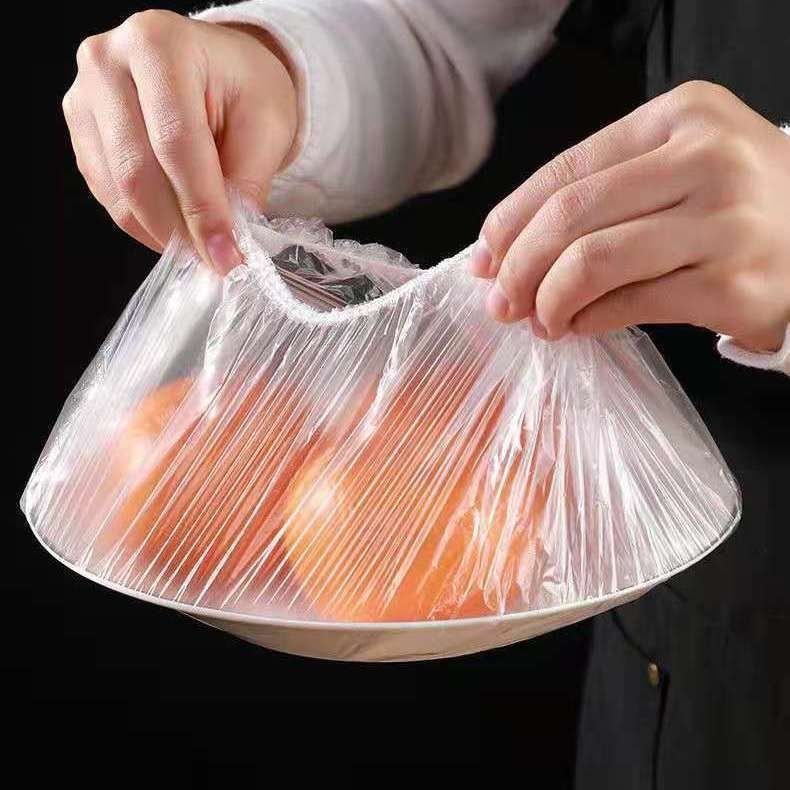 Free shipping plastic wrap household food grade refrigerator PE kitchen disposable plastic cover left-side food dust cover wholesale