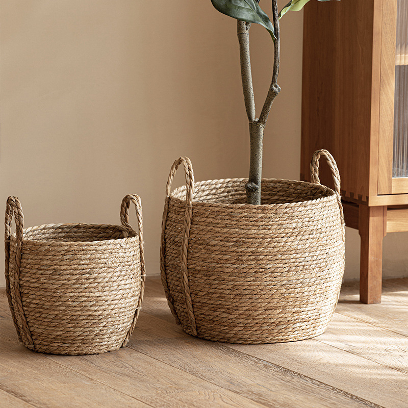 Wholesale pastoral style sea grass woven handmade flower basket with handle Rattan woven decorative flower pot large laundry basket clothes collection