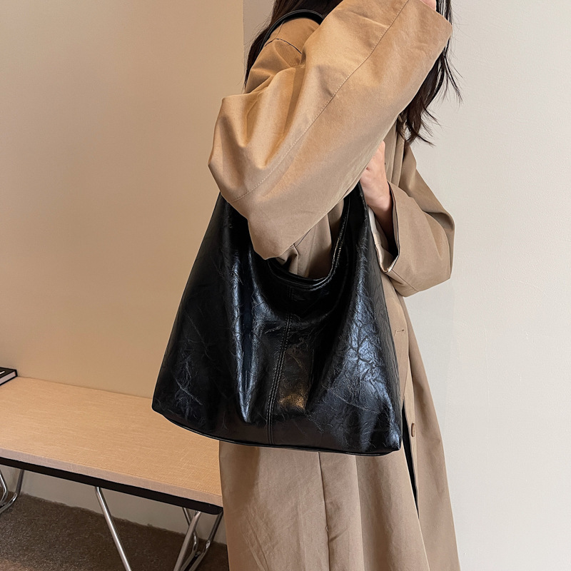 外国貿易の越境の潮の2024の新型の百合の柔らかい皮のショルダーバッグのファッション的な通勤の大容量のレジャーの子供の母の特包|undefined