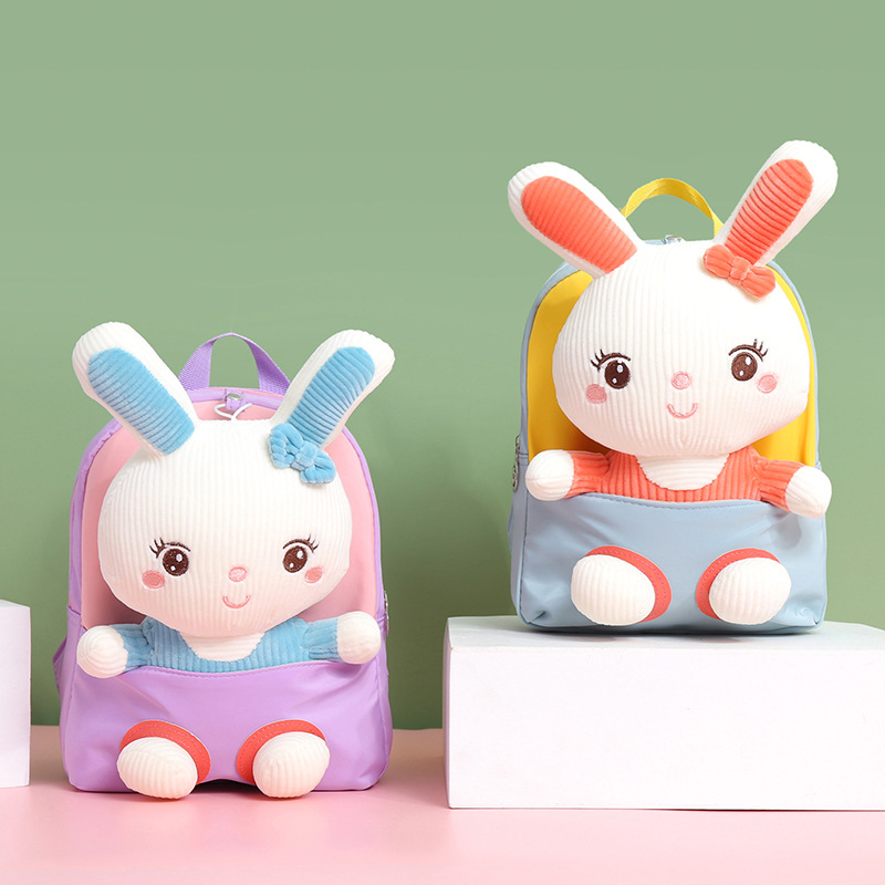 2023 new cartoon plush children's backpack kindergarten baby light schoolbag boys and girls baby schoolbag wholesale