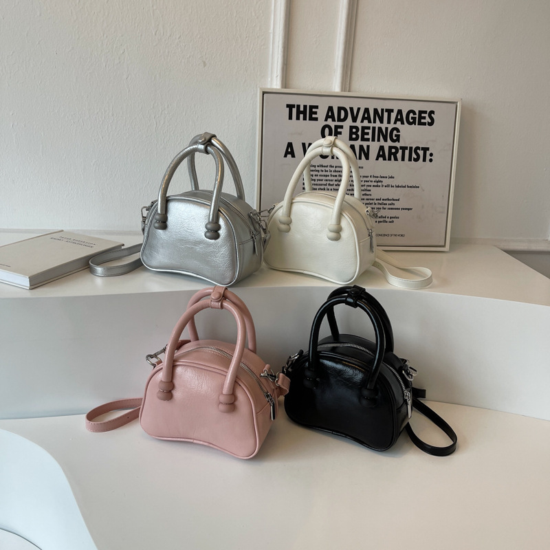 High-end Texture Women's Spring 2023 New Unique Design Shoulder Crossbody Bag Solid Color Hand-held Shell Bag