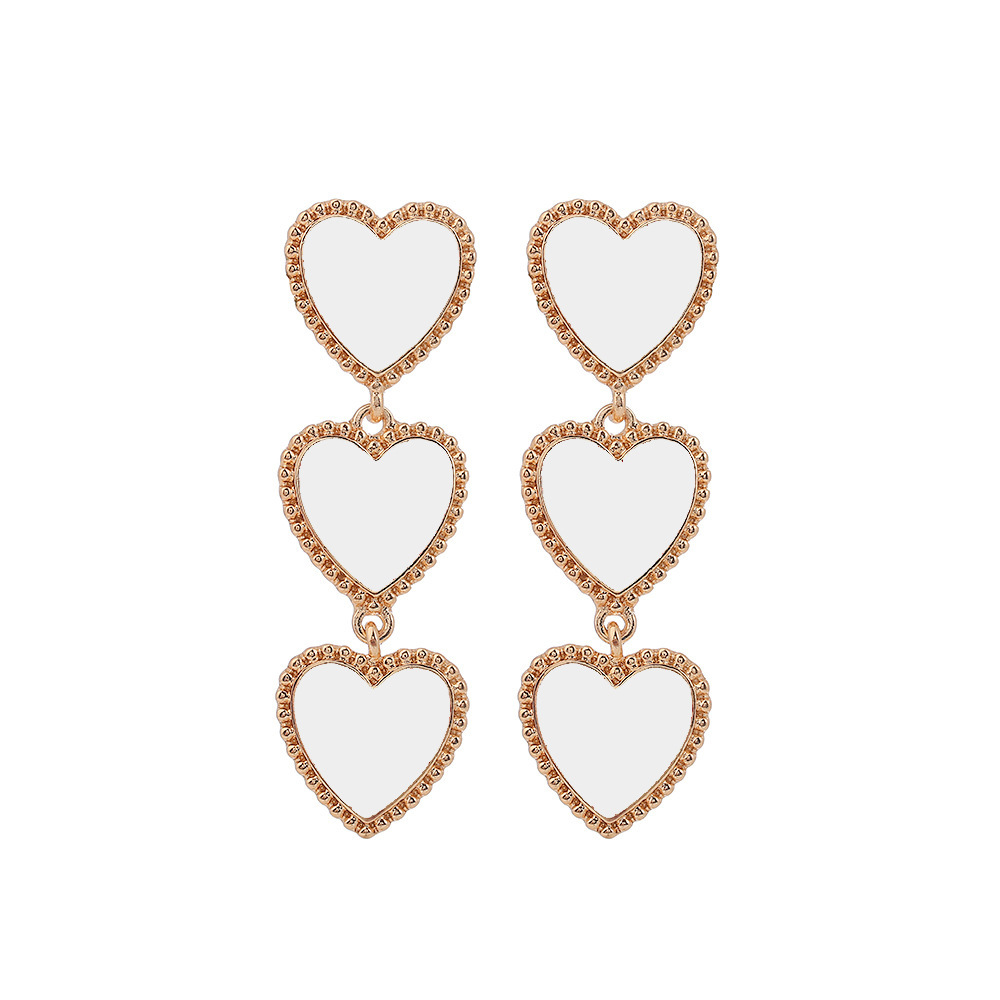 Cross-Border fashion foreign trade new elegant dripping red Love earrings simple European and American Peach heart tassel earrings
