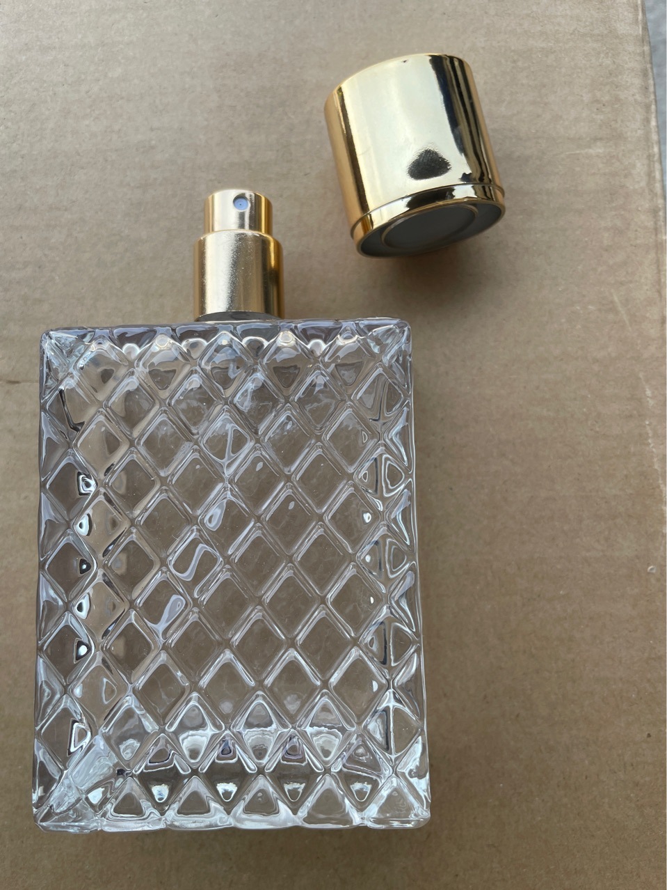 Spot 100ml grid thick glass spray bottle prismatic perfume bottle square makeup empty bottle