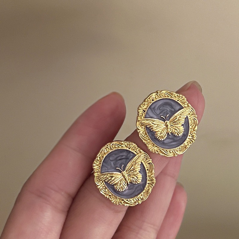 Beautiful twilight purple French retro butterfly drop glaze metal earrings, light luxury and high-end niche design with fairy temperament