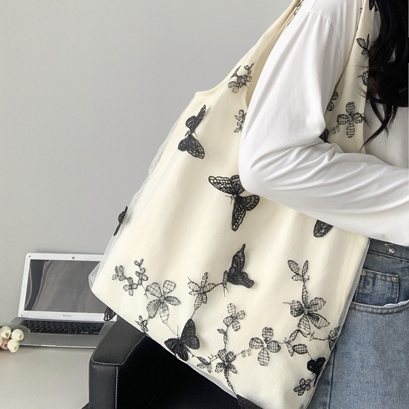 Super beautiful embroidered black butterfly canvas bag lace ..