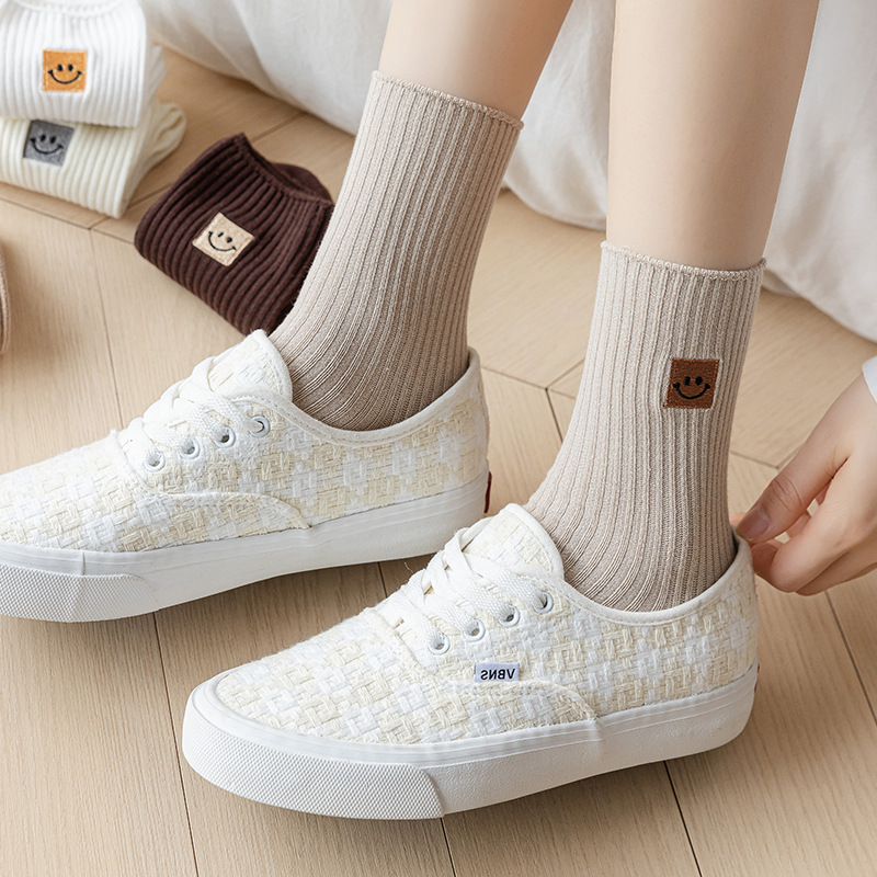 Double stitch socks children's solid color cotton socks spring and autumn smiling face embroidery mid-tube socks Japanese series Net red long tube socks wholesale