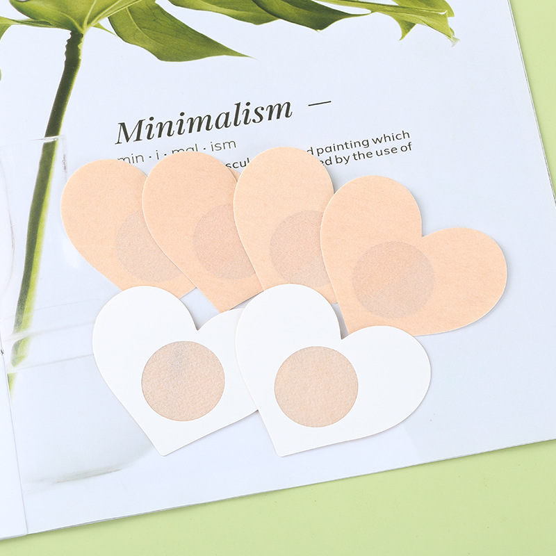 Disposable plum blossom breast patch disposable non-woven chest patch anti-light nipple patch invisible seamless chest patch wholesale