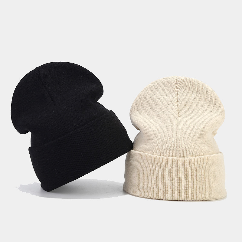 Autumn and winter New knitted hat women's solid color light board pile hat men's outdoor cold hat high quality fashion warm hat fashion