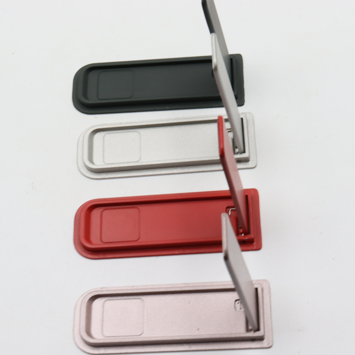 Mobile phone stand sticker invisible back sticker one-word mobile phone stand metal portable ultra-thin lazy desktop folding stand wholesale