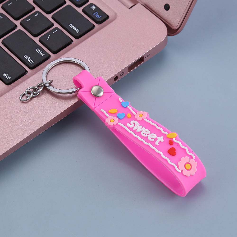 Trendy fashion key chain leather rope wholesale creative letter small flower PVC key chain pendant bag gift lanyard